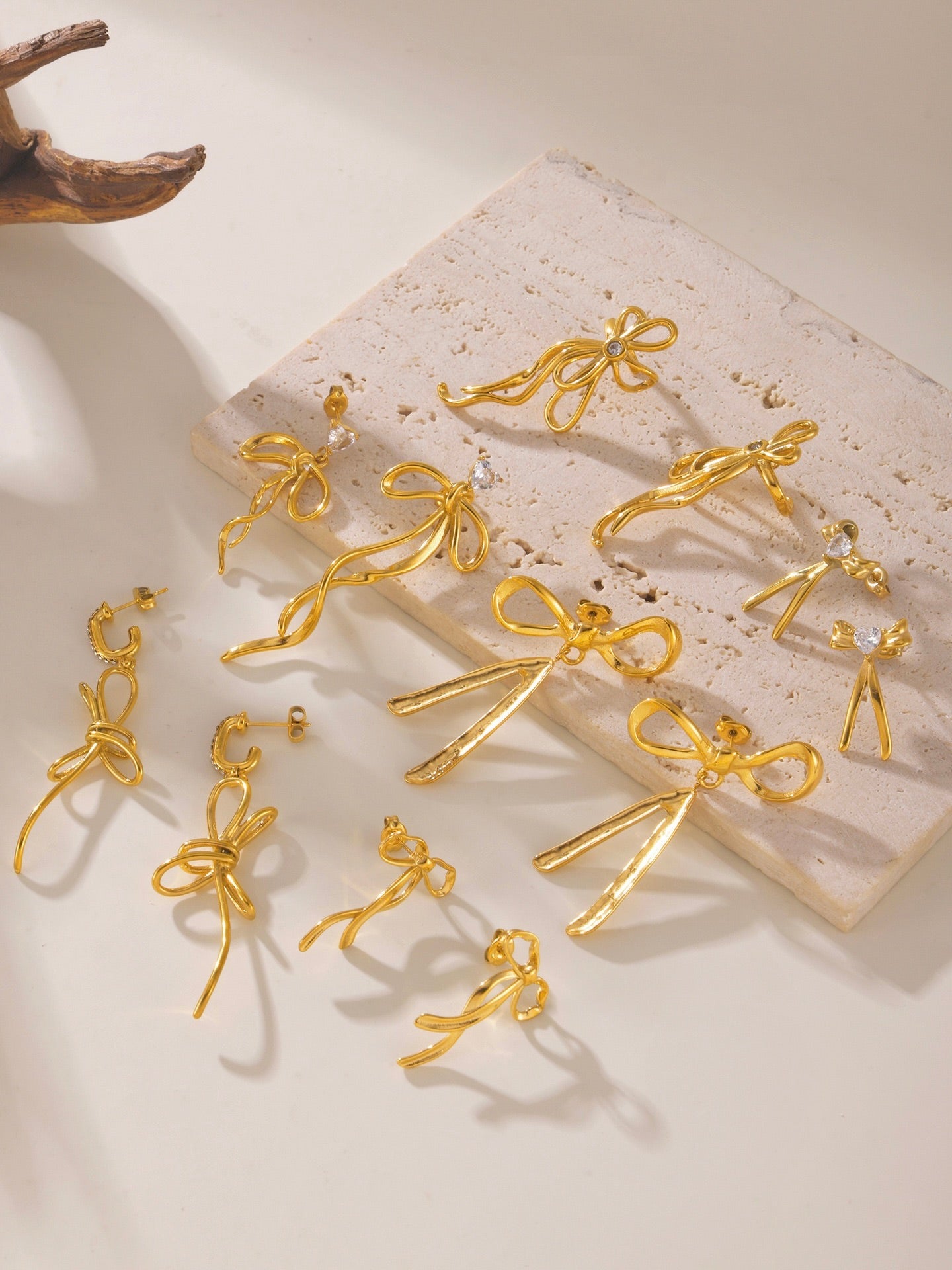 Golden Bow Asymmetrical Earrings