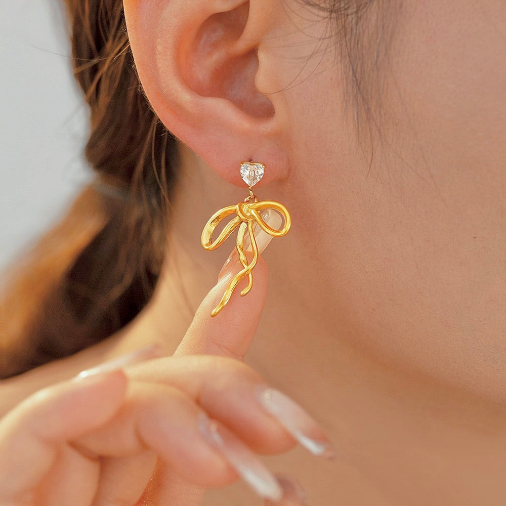 Golden Bow Asymmetrical Earrings