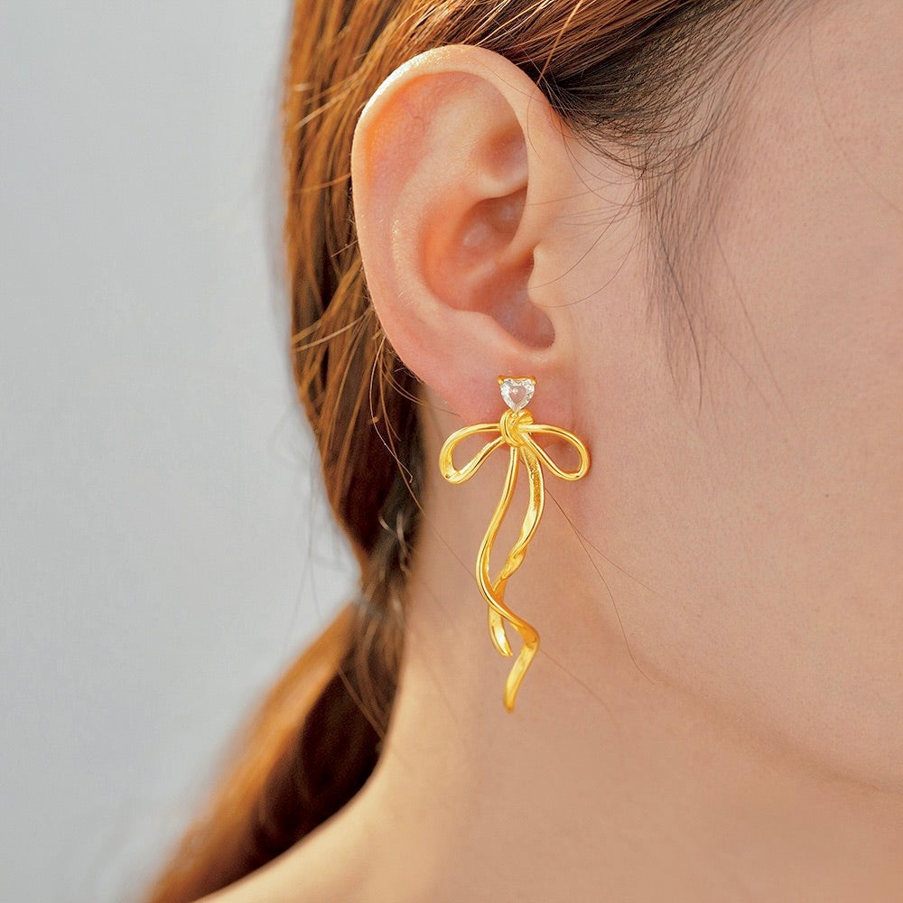 Golden Bow Asymmetrical Earrings