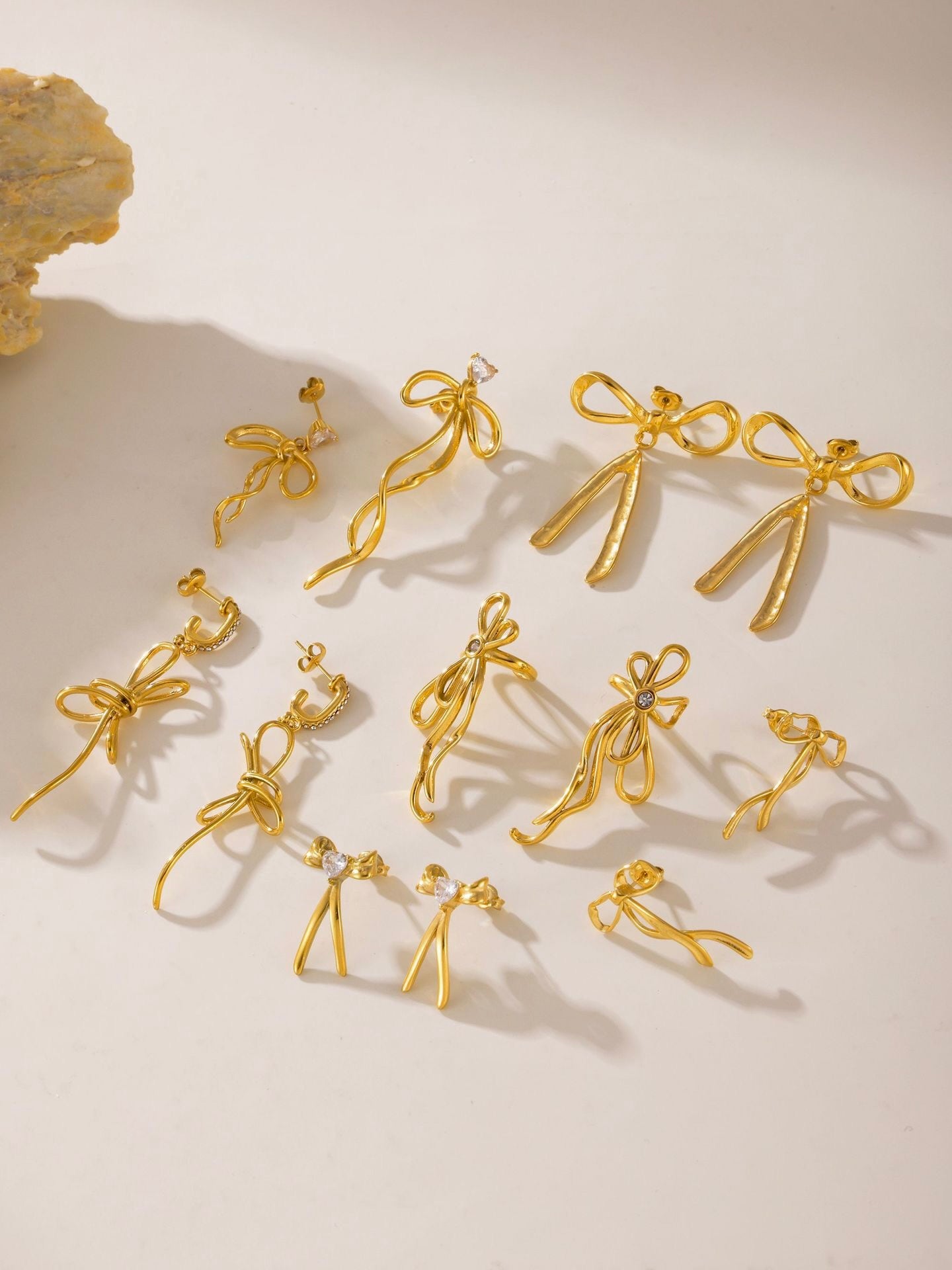 Golden Bow Asymmetrical Earrings