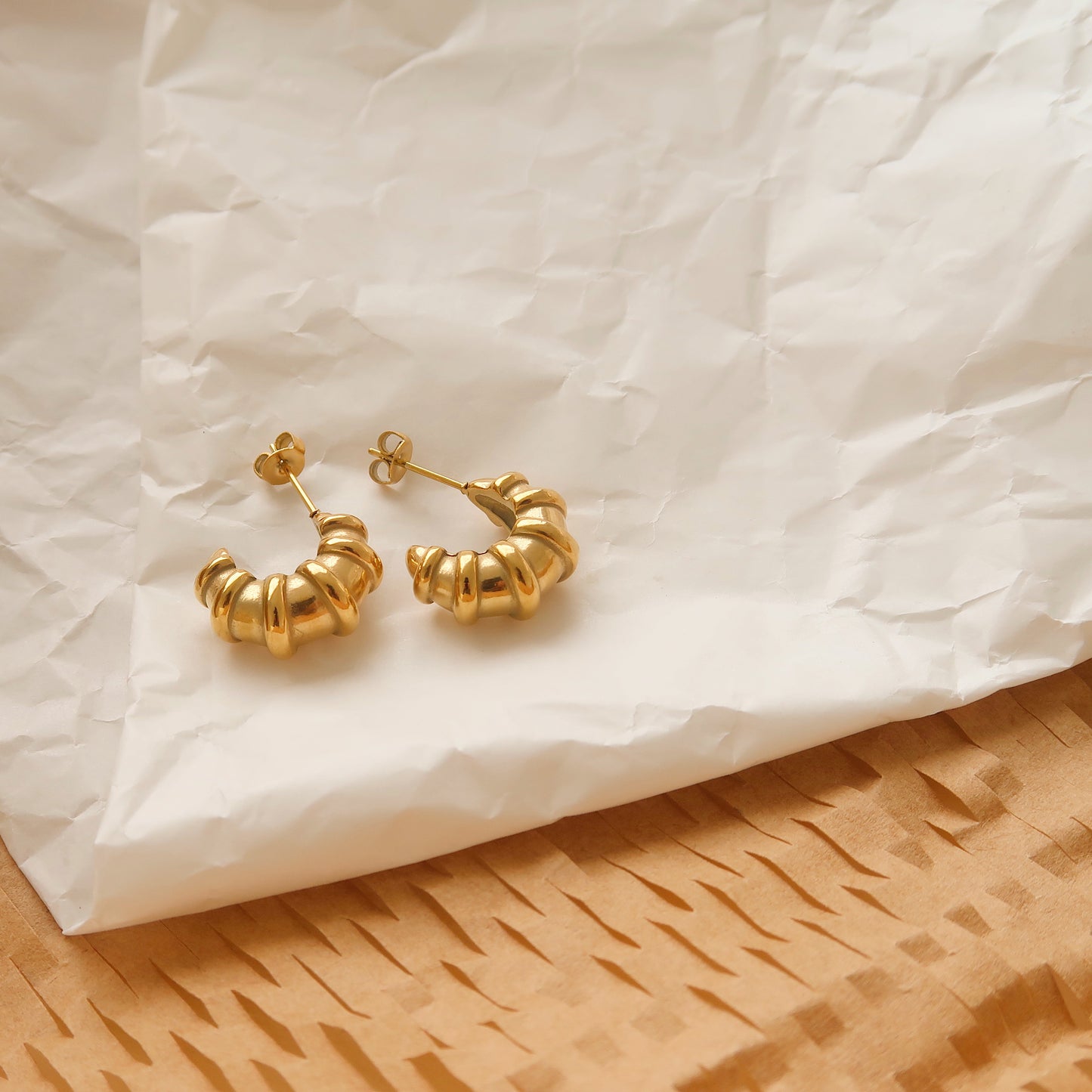 Croissant-Inspired Twisted Gold Hoops